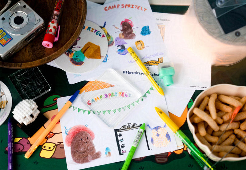 customizing a blank 5x7 postcard with a stamp that reads &quot;Camp Spritely&quot; in bubble letters